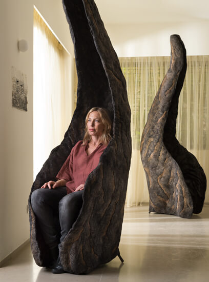 Designer Ayala Serfaty in one of her hand-made felt chairs.